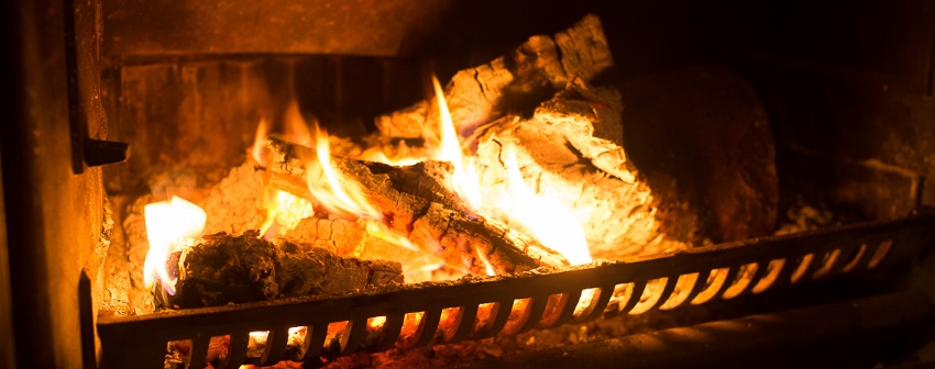Leman cottage roaring fire in woodburner